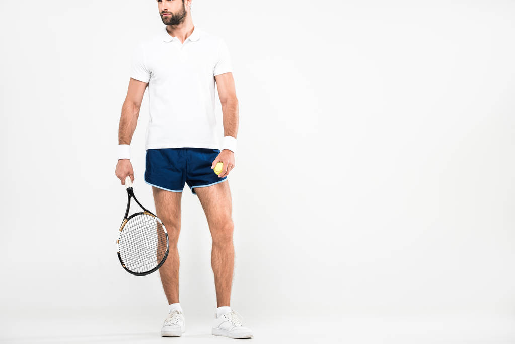 bearded tennis player in retro sunglasses standing with racket and ball, isolated on white   - Photo, Image