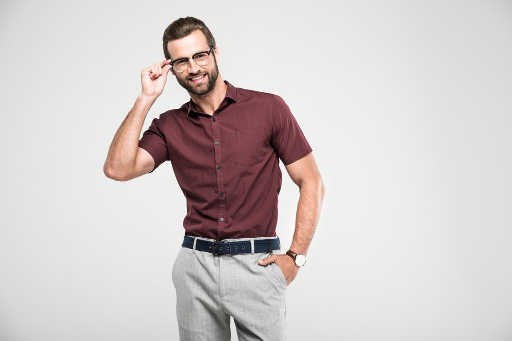 handsome smiling man posing in casual closing and eyeglasses, isolated on grey - Photo, Image