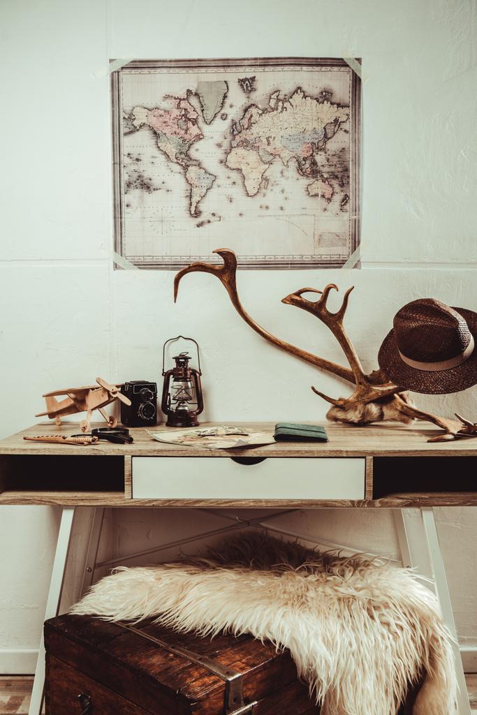 close up view of table with map, magnifying glasses and various decorations - Photo, Image