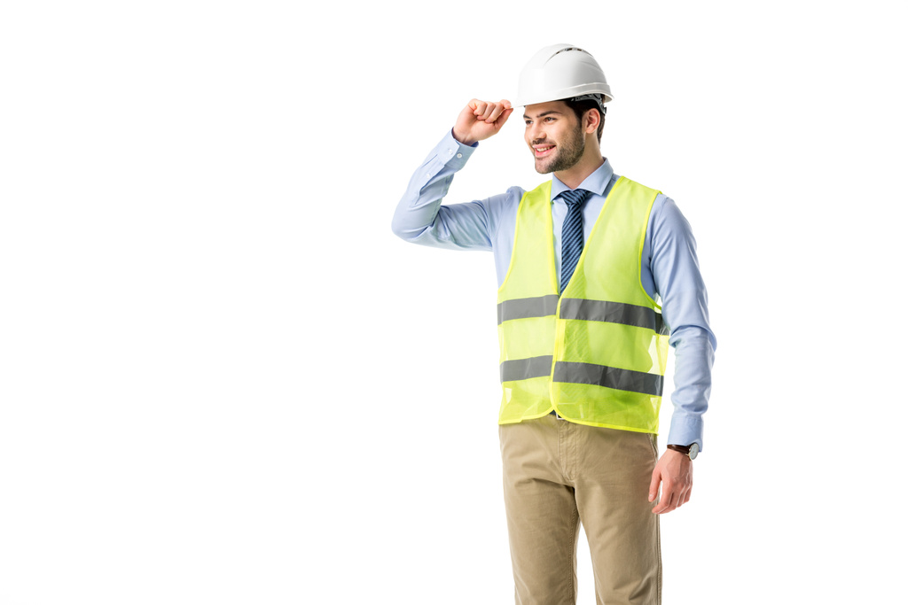 Смолящий строитель в бронежилете в шлеме, изолированный на белом
 - Фото, изображение