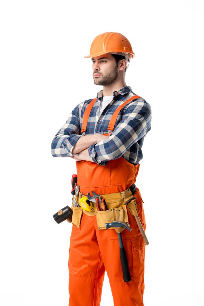 Confident repairman in orange overall and tool belt isolated on white - Photo, Image