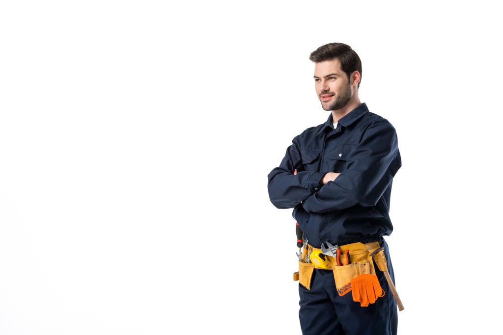 side view of plumber in uniform with arms crossed isolated on white - Photo, Image
