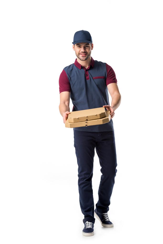 усміхнений чоловік доставки з картонними коробками для піци ізольовані на білому
 - Фото, зображення