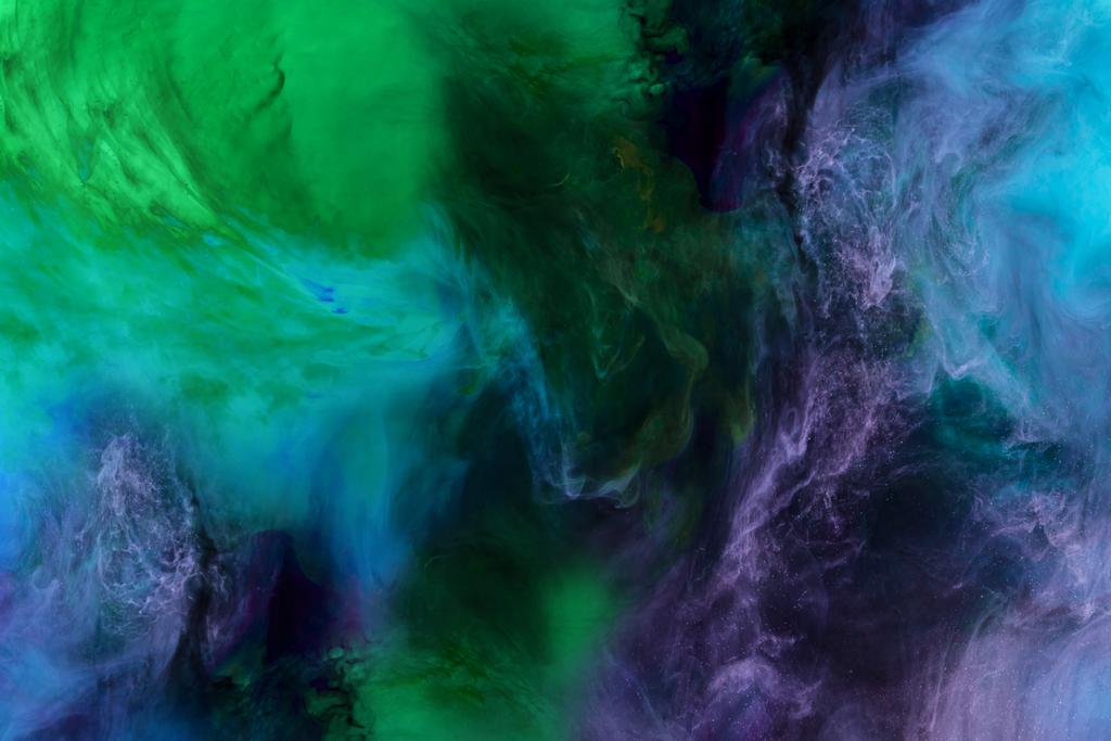 artistic texture with blue, purple and green paint swirls looks like space - Photo, Image