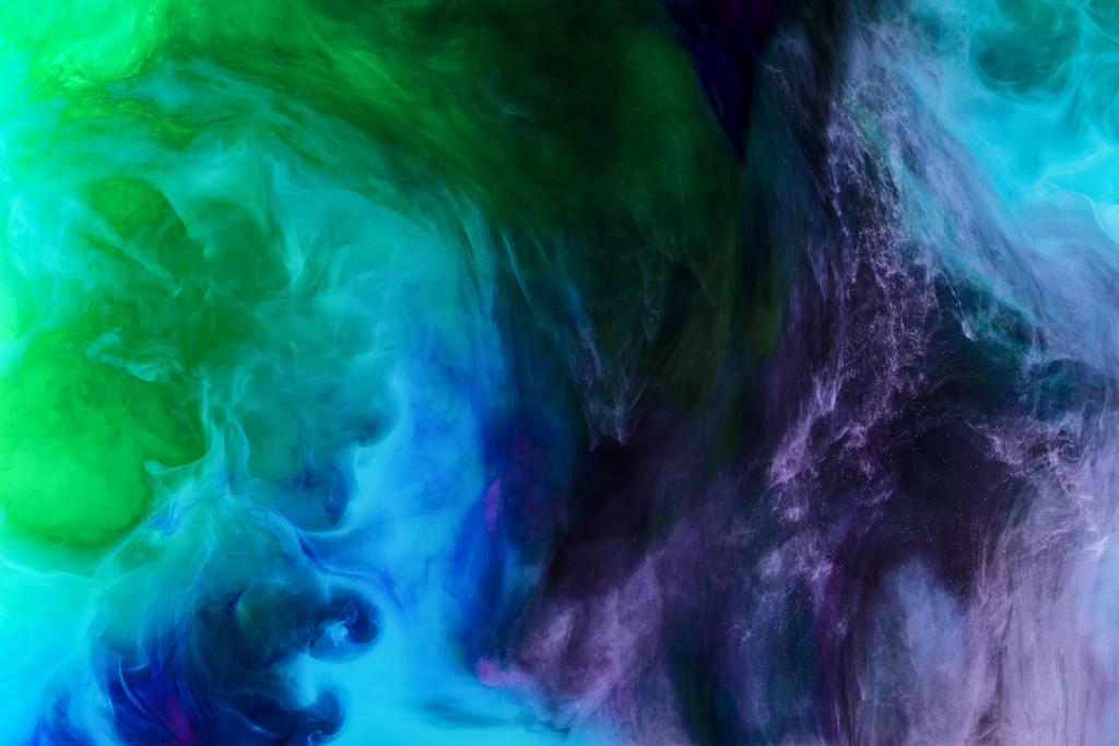 creative background with blue, purple and green paint swirls looks like space - Photo, Image