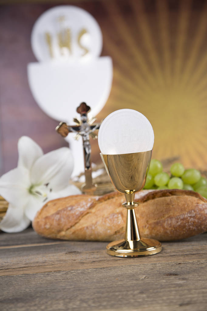Eucharist symbol of bread and wine, chalice and host, First comm - Photo, Image