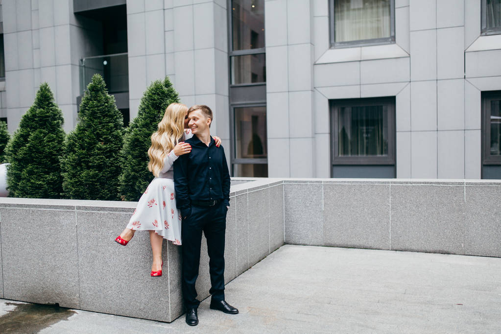 young beautiful couple posing in  city  - Photo, Image