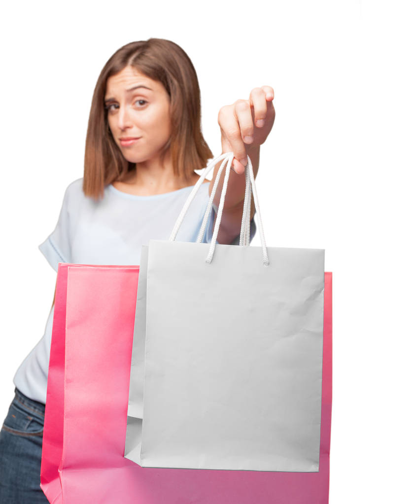 jonge mooie vrouw met shopping tassen - Foto, afbeelding