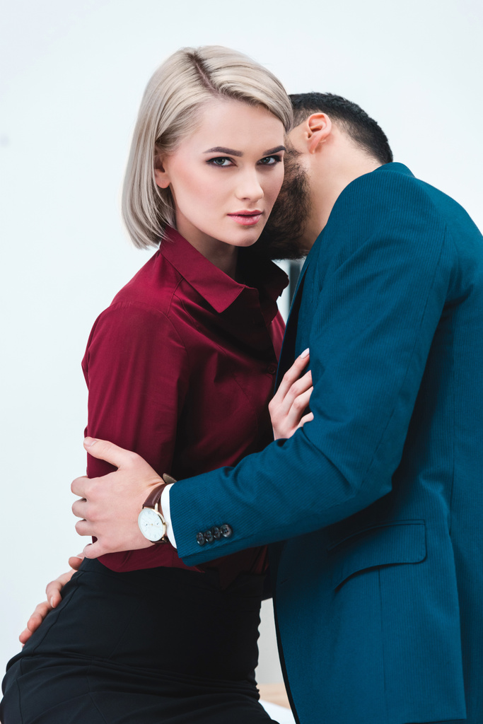 seductive young couple of business people kissing and flirting  - Photo, Image