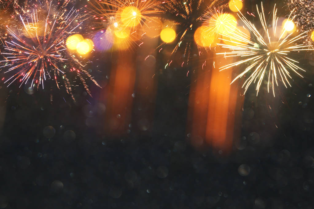 resumo fundo glitter preto e ouro com fogos de artifício. véspera de Natal, conceito de feriado 4 de julho. - Foto, Imagem