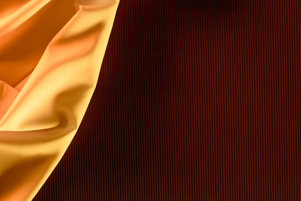 close up view of orange elegant silk fabric as background - Photo, Image