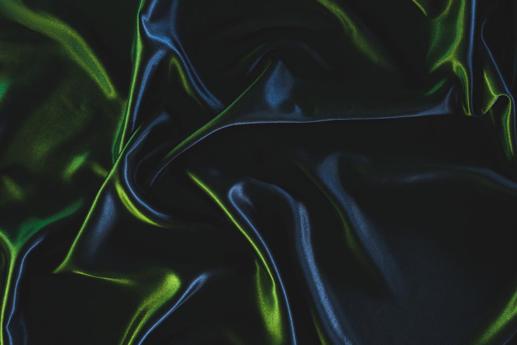 полный кадр из темно-элегантной шелковой ткани в качестве фона
 - Фото, изображение