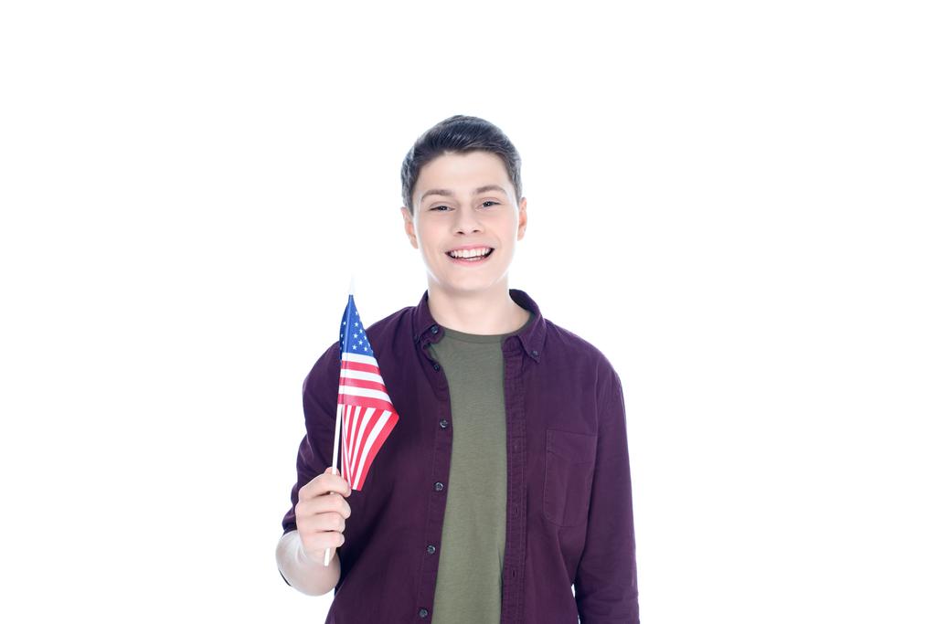 sonriente adolescente estudiante con EE.UU. bandera aislado en blanco
 - Foto, imagen