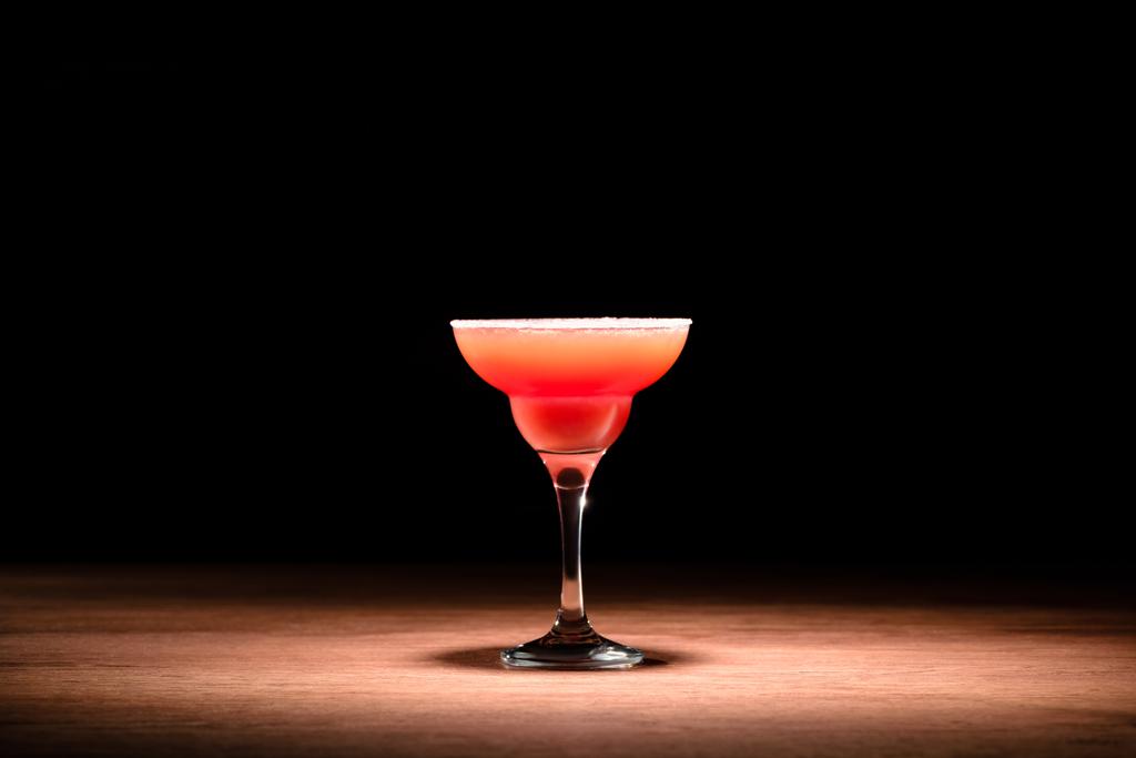red alcohol cocktail on wooden table - Photo, Image