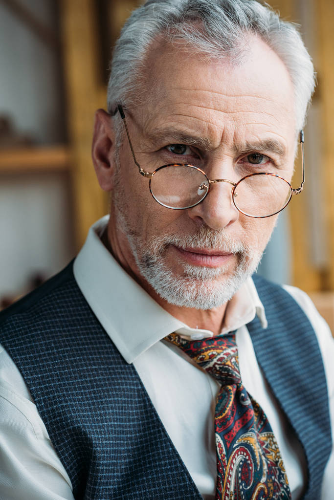 close-up shot of handsome mature man in stylish clothing looking at camera - Photo, Image