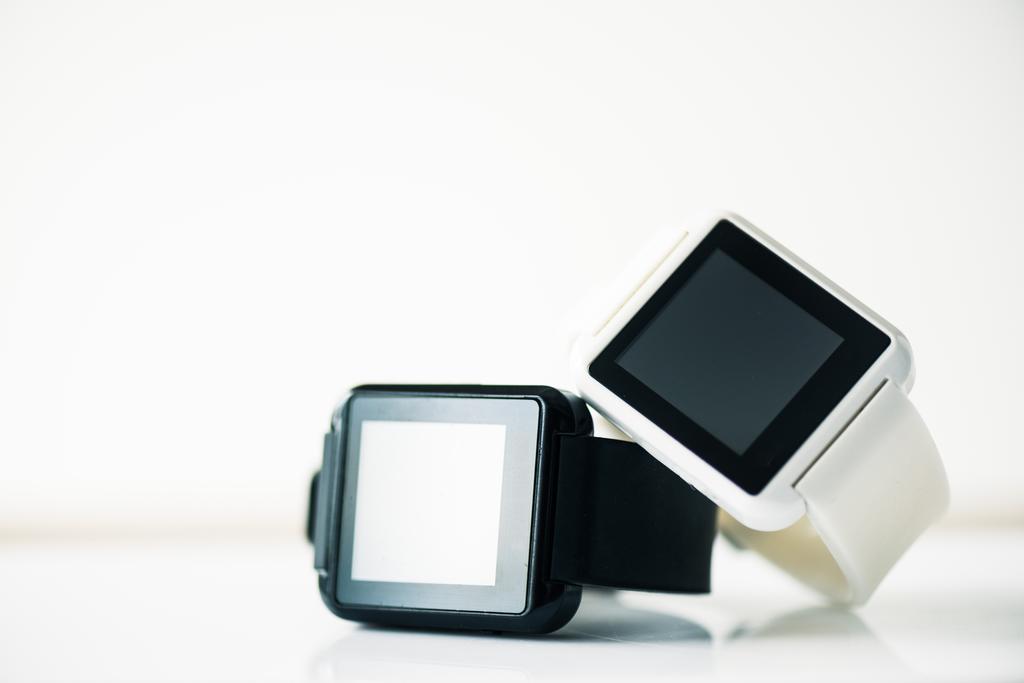 close-up view of smartwatches with blank screens on grey   - Photo, Image