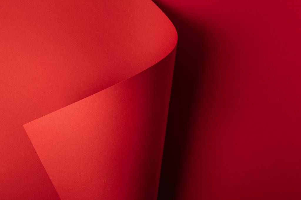 明るい赤色の装飾的な紙の抽象的な背景    - 写真・画像