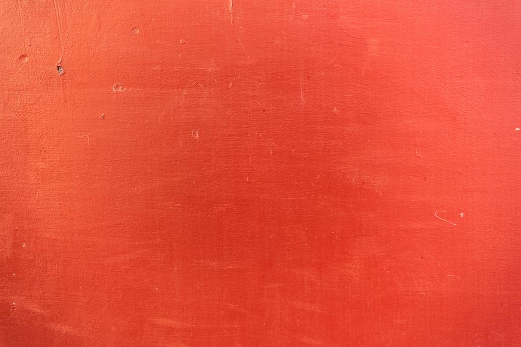 close-up view of bright red scratched textured background - Photo, Image