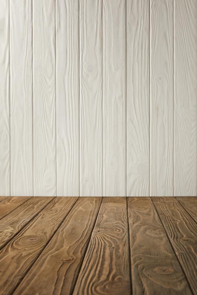 brown striped tabletop and white wooden wall - Photo, Image