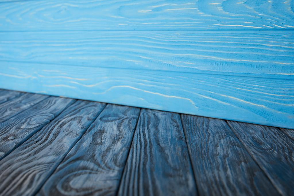 dark blue grungy wooden floor and light blue wooden wall - Photo, Image