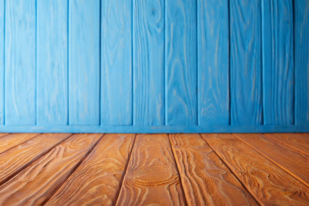 brown striped tabletop and blue wooden wall - Photo, Image