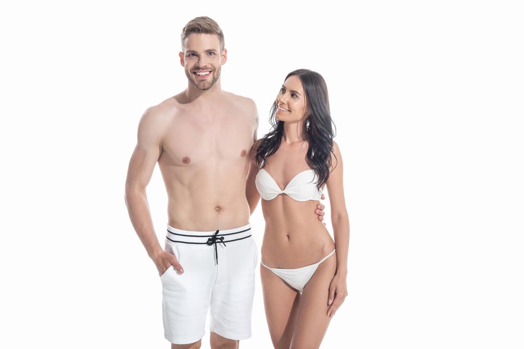 fiatal pár fürdőruha átfogó elszigetelt fehér - Fotó, kép