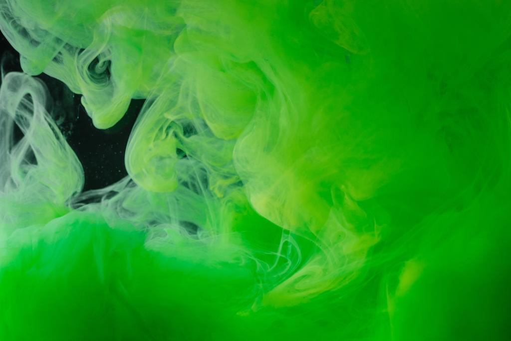 lähikuva kirkkaan vihreä abstrakti virtaava muste mustalla taustalla
    - Valokuva, kuva