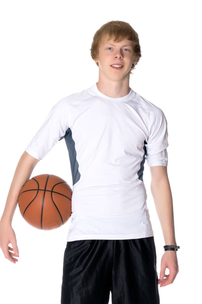 Добре зроблений хлопець з м'ячем для баскетболу
 - Фото, зображення