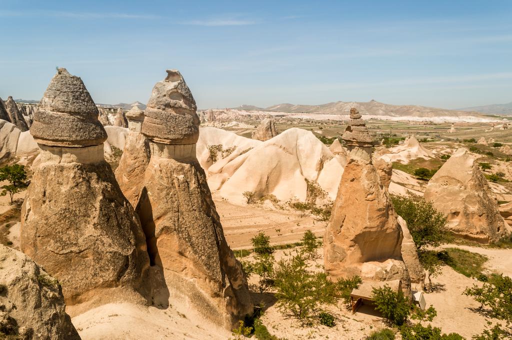 elevated view of stone formations in valley and mountains, Cappadocia, Turkey  - Photo, Image