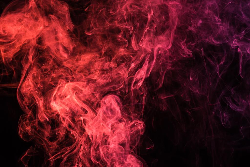 κόκκινο μυστικιστική καπνιστή στροβιλισμού σε μαύρο φόντο - Φωτογραφία, εικόνα