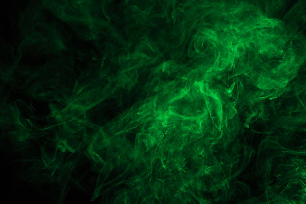 zöld misztikus füst a fekete absztrakt háttér  - Fotó, kép