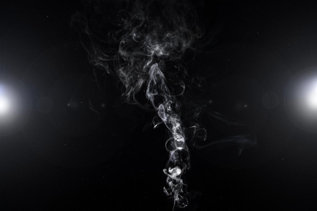 sfondo astratto con vortice fumoso bianco e luci sul nero
 - Foto, immagini