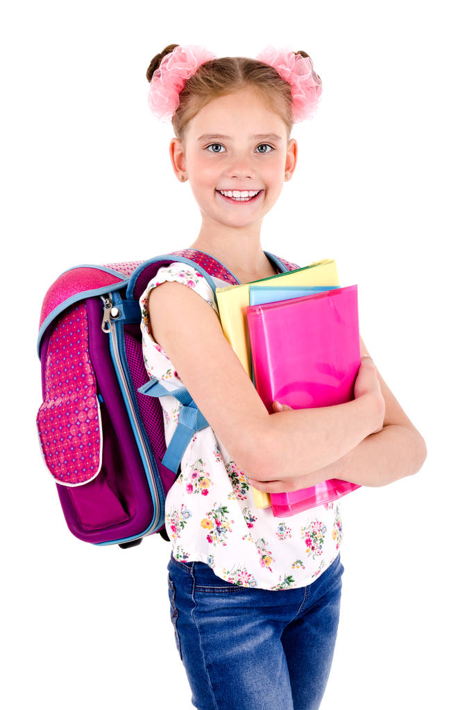 Ritratto di bambina sorridente felice della scuola con lo zaino della borsa della scuola ed i libri isolati su un concetto bianco di istruzione di fondo
 - Foto, immagini