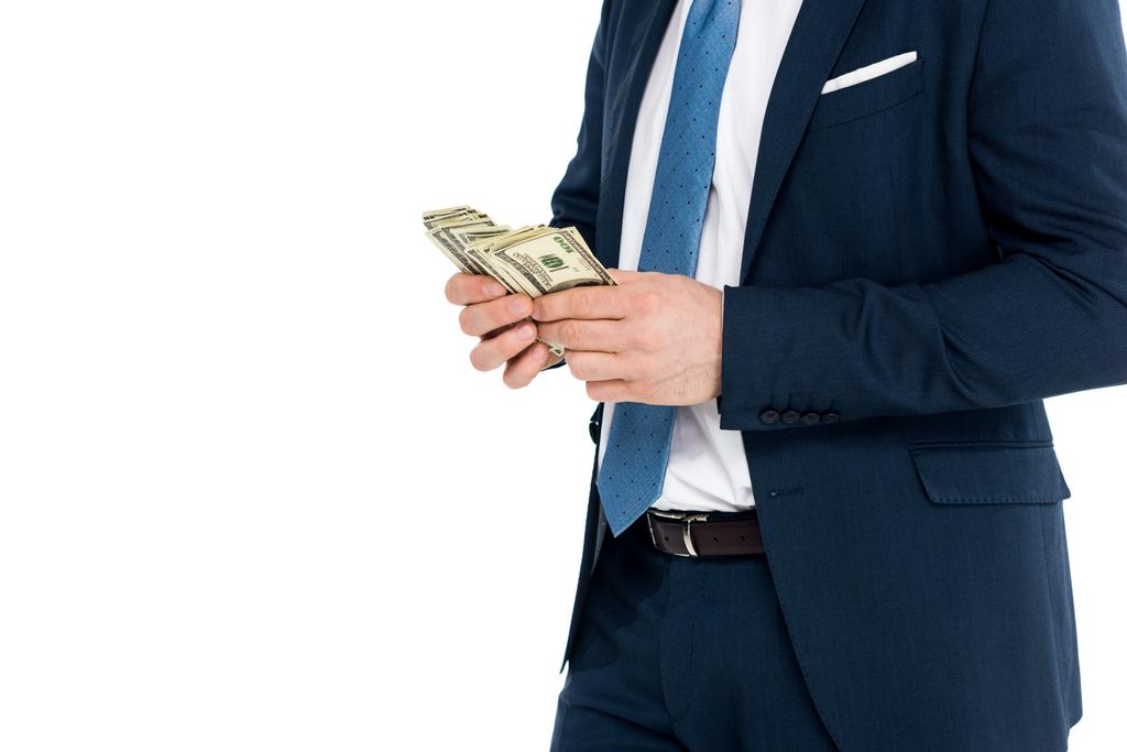 обрізаний знімок бізнесмена в формальному носінні, рахуючи доларові банкноти ізольовані на білому
 - Фото, зображення