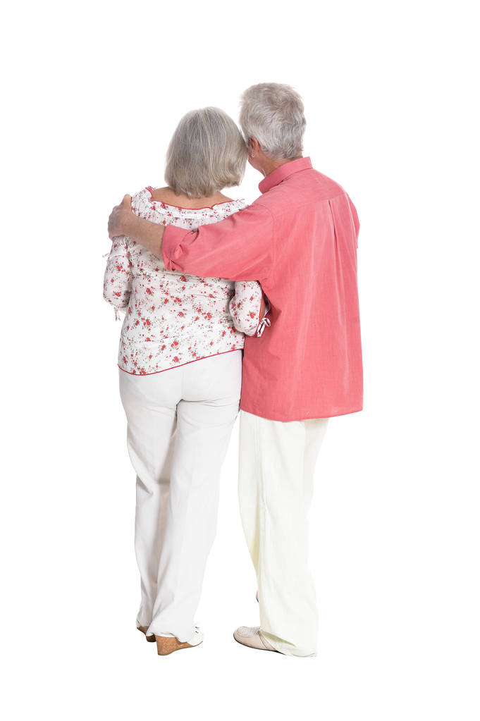 Portrait complet d'un couple de personnes âgées embrassant isolé sur fond blanc
 - Photo, image