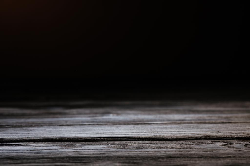 grey rustic wooden surface isolated on black - Photo, Image