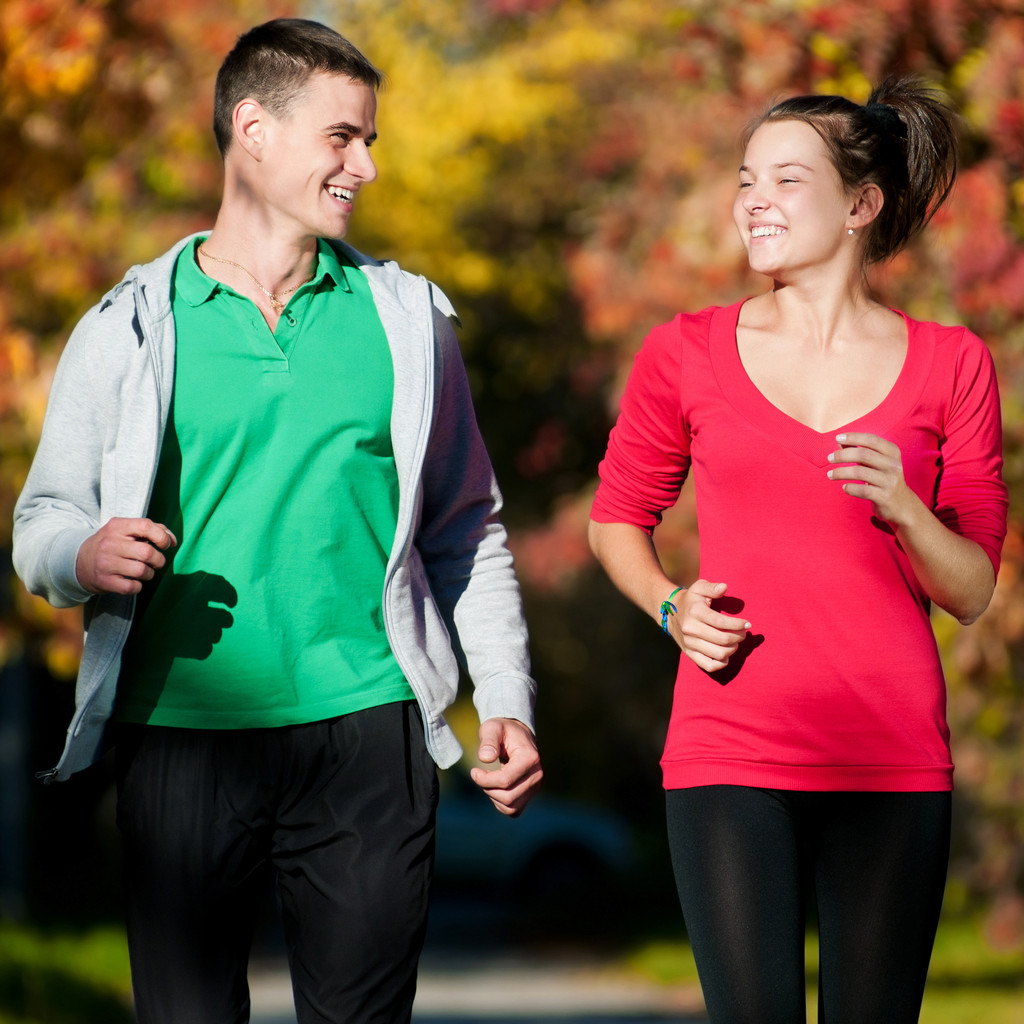 Young man and woman running - Photo, Image