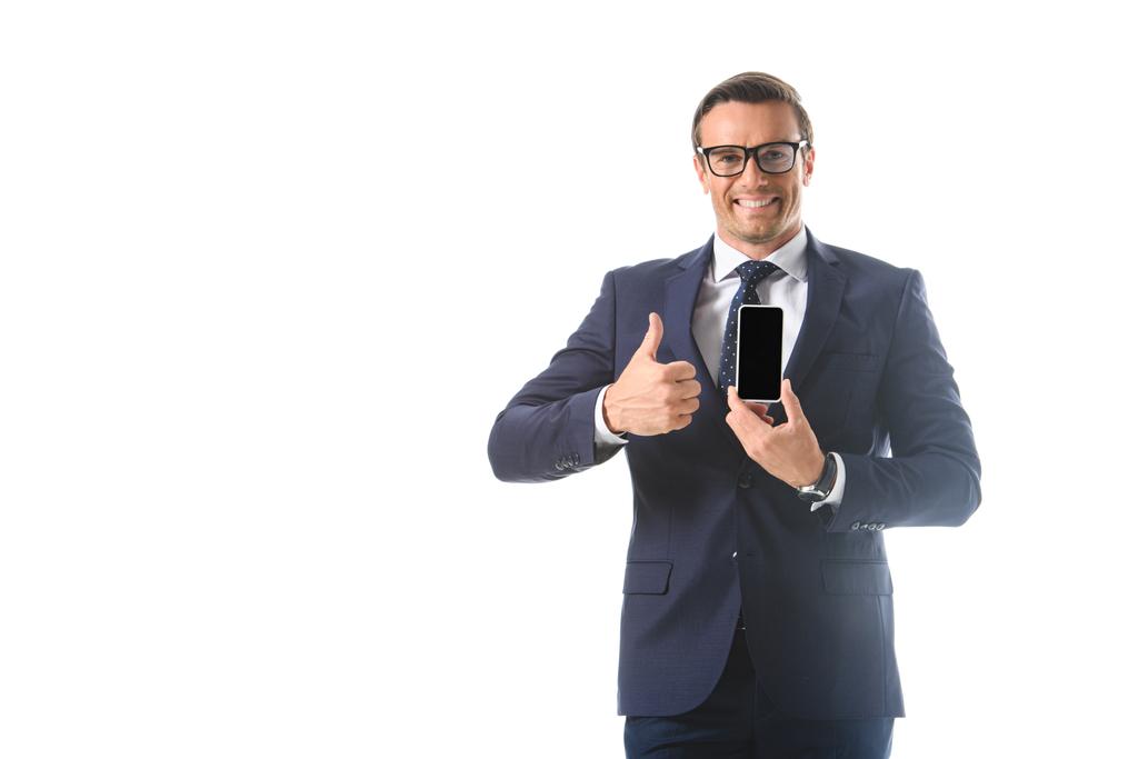 επιχειρηματίας κρατώντας smartphone με κενή οθόνη και να κάνει τον αντίχειρα επάνω χειρονομία που απομονώνονται σε λευκό φόντο  - Φωτογραφία, εικόνα