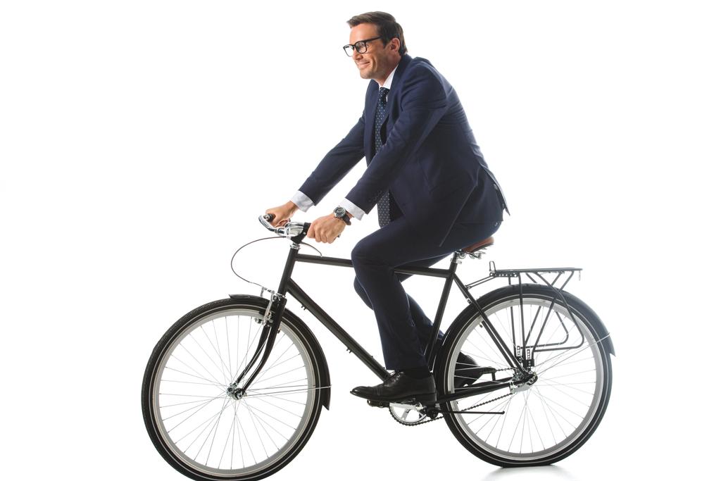 mosolygó üzletember a szemüvegek, lovaglás kerékpár elszigetelt fehér background  - Fotó, kép