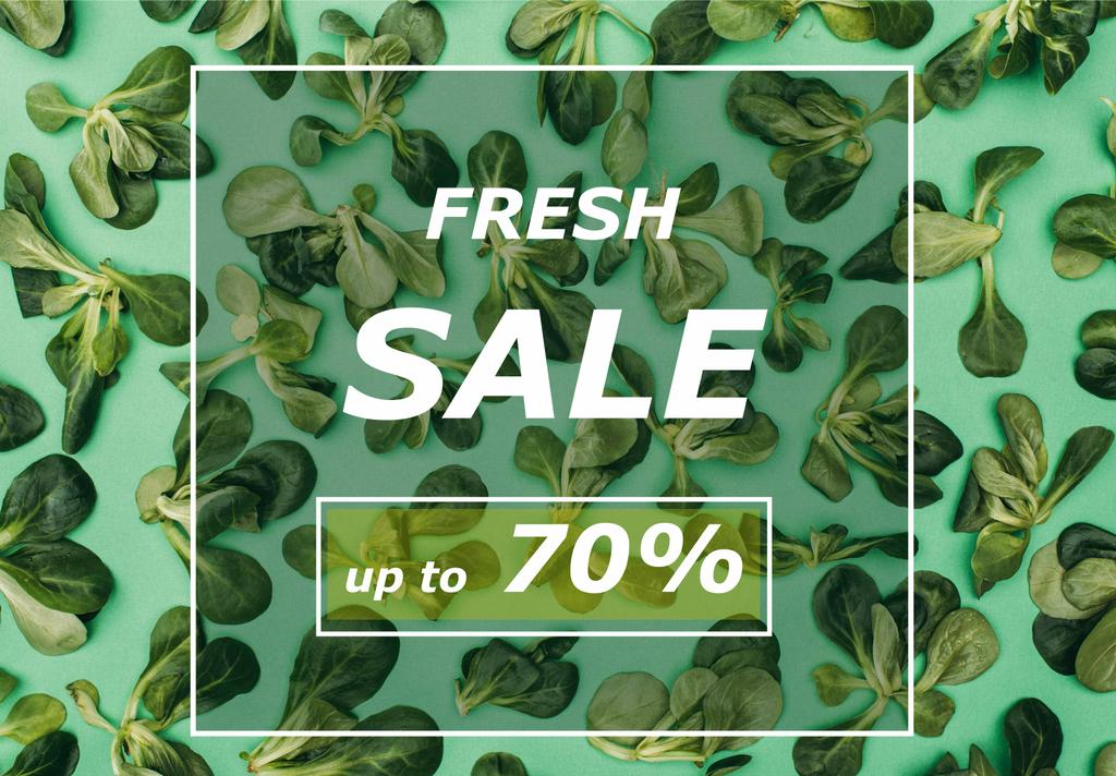 κάτοψη του λευκό τετράγωνο πλαίσιο με λόγια πώληση φρέσκα και όμορφα φρέσκα πράσινα φύλλα σε πράσινο - Φωτογραφία, εικόνα