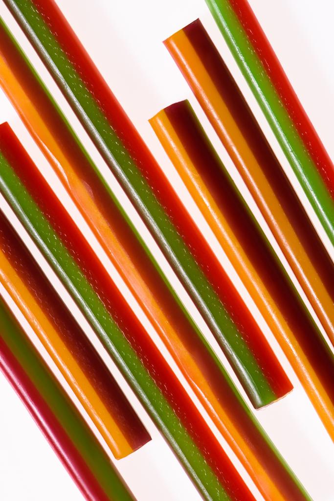 top view of colorful gummy stripes isolated on white - Photo, Image