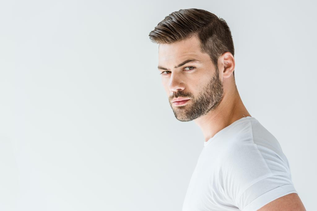 Stylish young brunette bearded man isolated on white background - Photo, Image