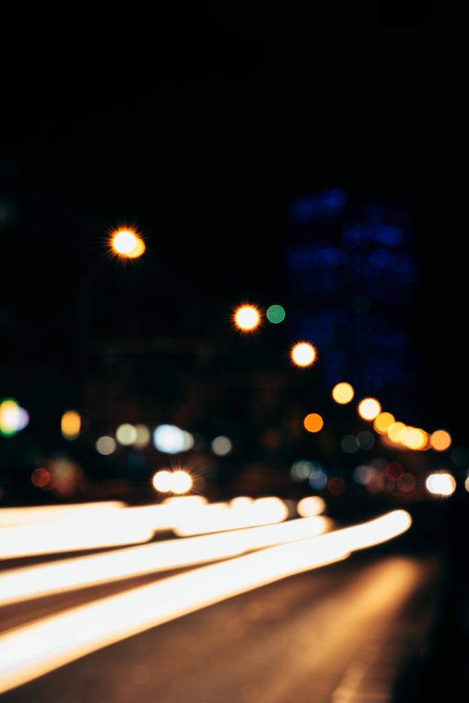 барвисті боке вогні нічного міста як фон
 - Фото, зображення