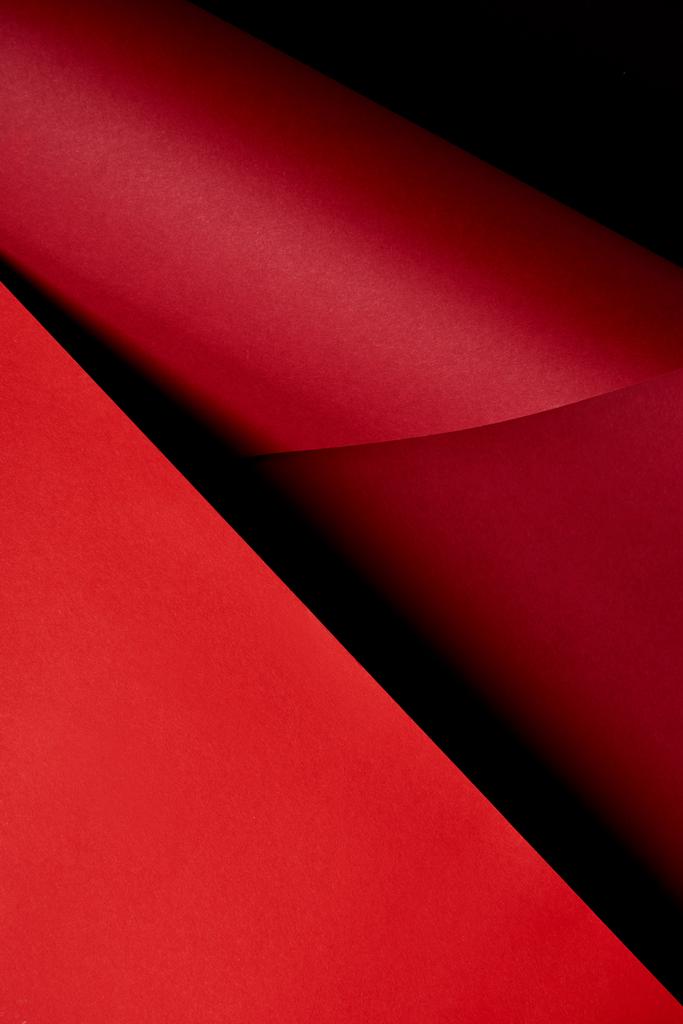 Paper sheets in red tones background - Photo, Image