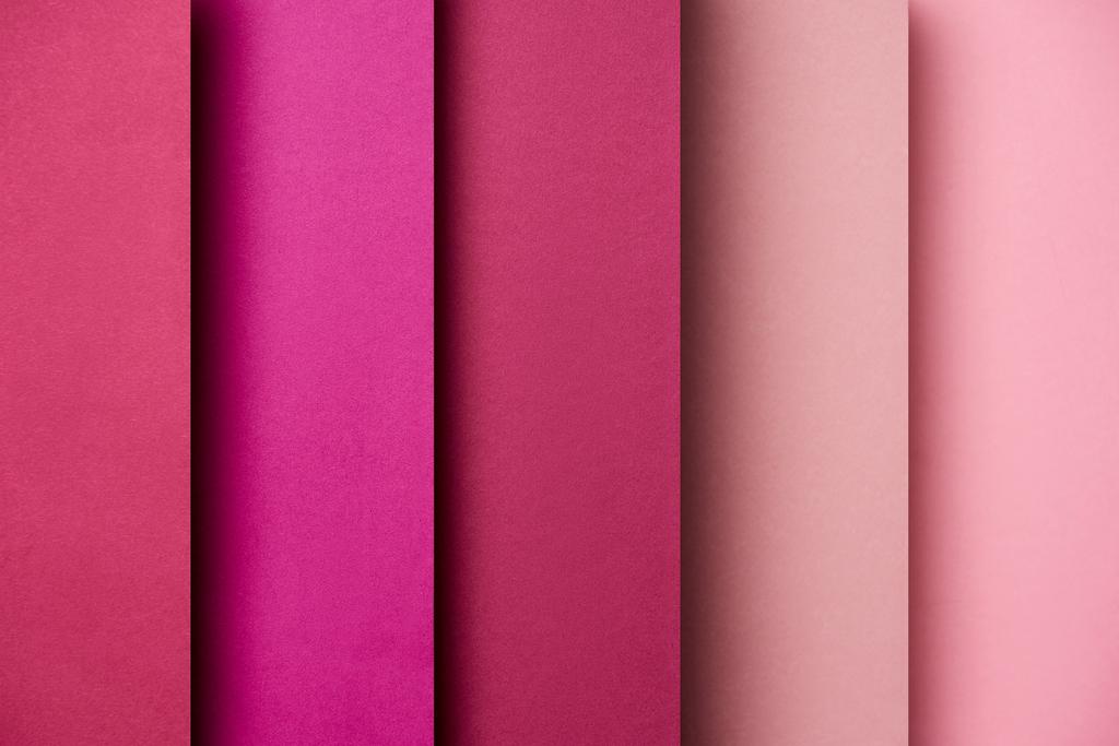 Pattern of overlapping paper sheets in pink and magenta tones - Photo, Image