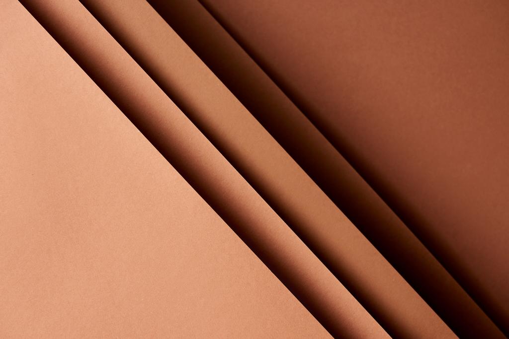 Pattern of overlapping paper sheets in brown tones - Photo, Image