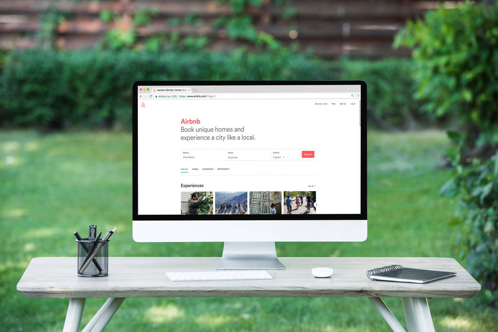 selective focus of computer with airbnb website at table outdoors  - Photo, Image