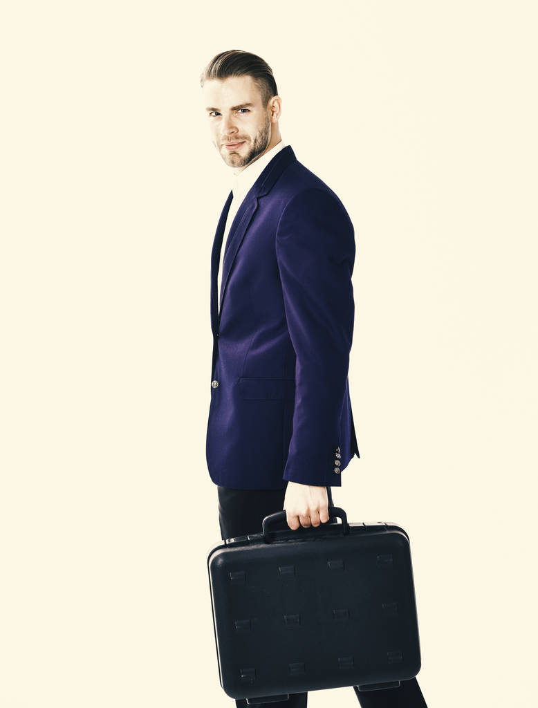 Man carries black case in hand. Business people concept. - Photo, Image