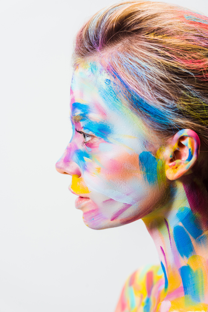 vista laterale della ragazza attraente con colorata arte del corpo luminoso isolato su bianco
  - Foto, immagini