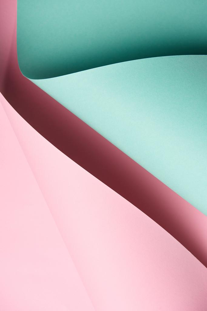 Nahaufnahme von abstrakten, kreativen türkis- und rosafarbenen Papierhintergründen    - Foto, Bild